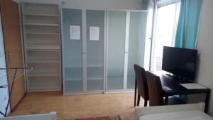 TV a/nebo společenská místnost v ubytování Vienna Rooms Nr 3