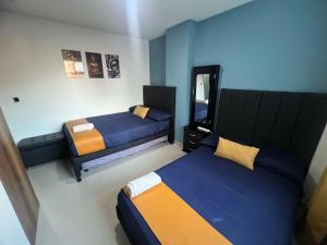 Postel nebo postele na pokoji v ubytování Apartamento Ángel Namaste
