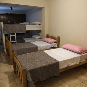 Ένα ή περισσότερα κρεβάτια σε δωμάτιο στο Casa amplia/Excelente ubicación +11 φωτογραφίες