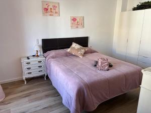 Postel nebo postele na pokoji v ubytování Alojamientos Capri