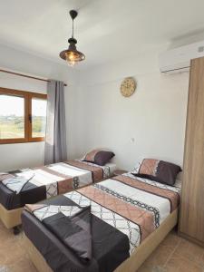 Postel nebo postele na pokoji v ubytování Villa Del Mare