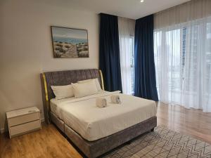 Postel nebo postele na pokoji v ubytování Quill Residence Suites KLCC Sunlight + 95 fotografií