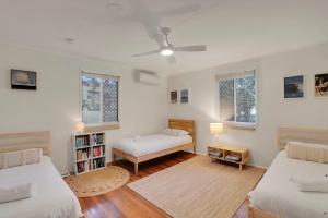 Ένα ή περισσότερα κρεβάτια σε δωμάτιο στο 16 Bigoon Road