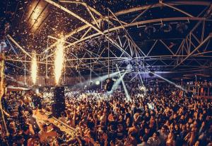 a large crowd of people at a concert at Villa Mostar - Resort Rozic in Mostar +57 photos