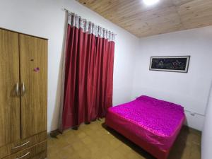 Postel nebo postele na pokoji v ubytování Rubi - Mendoza Capital