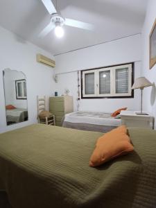 Ένα ή περισσότερα κρεβάτια σε δωμάτιο στο Casa Forum
