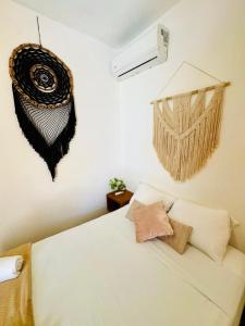 Ένα ή περισσότερα κρεβάτια σε δωμάτιο στο Hotel AKBAL Holbox +35 φωτογραφίες