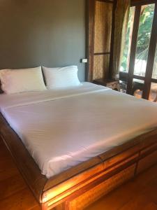Postel nebo postele na pokoji v ubytování Pai resort pageryaw