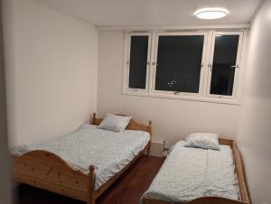 Postel nebo postele na pokoji v ubytování Lovely apartment during the World Cup 2025