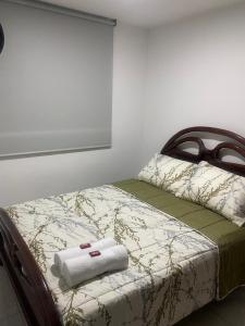 Ένα ή περισσότερα κρεβάτια σε δωμάτιο στο Apartamento Amoblado De Lujo En Cúcuta +22 φωτογραφίες