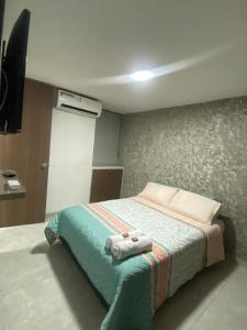 Ένα ή περισσότερα κρεβάτια σε δωμάτιο στο Apartamento Amoblado De Lujo En Cúcuta