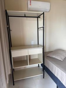 En eller flere senge i et værelse på Residencial Lara 7