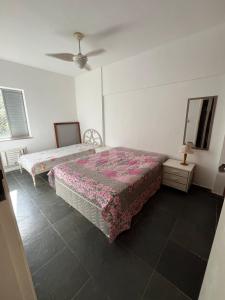 Φωτογραφία από το άλμπουμ του Apartamento Guarujá - Praia Enseada σε Γκουαρούχα +2 φωτογραφίες