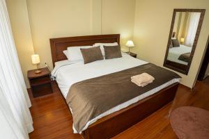 Ένα ή περισσότερα κρεβάτια σε δωμάτιο στο Casita Linda Baños