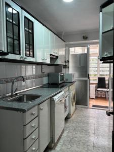 Una cocina o cocineta en Tropico Apartament