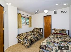 Postel nebo postele na pokoji v ubytování ManVee at Yosemite