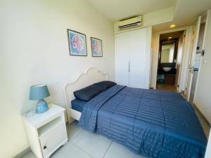 Uma cama ou camas num quarto em Unixx Pattaya High floor view