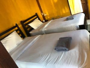 Postel nebo postele na pokoji v ubytování Pai resort pageryaw