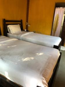 Postel nebo postele na pokoji v ubytování Pai resort pageryaw