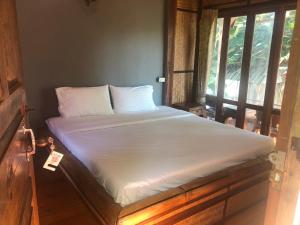 Postel nebo postele na pokoji v ubytování Pai resort pageryaw