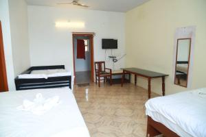 Voodi või voodid majutusasutuse Rainforest villa toas