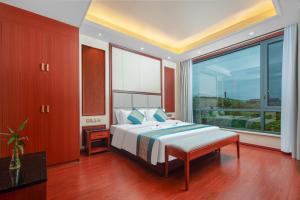 Ένα ή περισσότερα κρεβάτια σε δωμάτιο στο Chenzhou Zhuyuan Hotel +42 φωτογραφίες