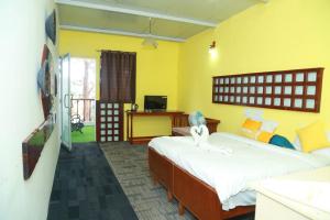 Voodi või voodid majutusasutuse Rainforest villa toas
