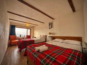 Voodi või voodid majutusasutuse Art Hotel Sevan toas