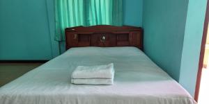 Chok Phikul Thong Resort客房内的一张或多张床位
