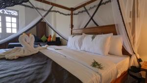 Voodi või voodid majutusasutuse Lake view nest toas