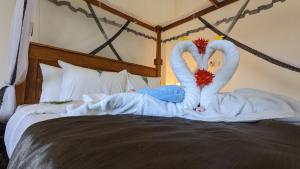 Voodi või voodid majutusasutuse Lake view nest toas