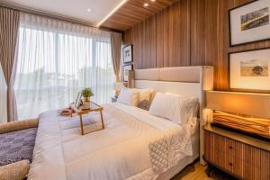 En eller flere senge i et værelse på D'Kamboja Villa Nusa Dua + 30 billeder