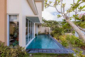 Swimmingpoolen hos eller tæt på D'Kamboja Villa Nusa Dua