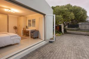 Ένα ή περισσότερα κρεβάτια σε δωμάτιο στο Tuis en Tevrede - 2 Bedroom Flat