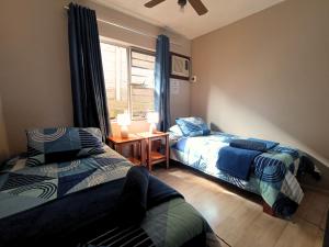 Rúm í herbergi á Just Property Zululand +16 myndir