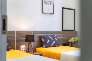 Postel nebo postele na pokoji v ubytování La Cle' Đà Lạt