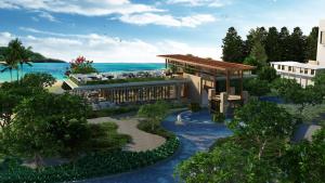 una vista aerea di un resort con l'oceano di Angsana Lang Co a Lăng Cô