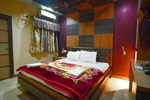 Postel nebo postele na pokoji v ubytování Hotel Prashant Near Jahaz Bari New Digha + 28 fotografií