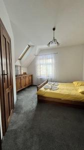 Postel nebo postele na pokoji v ubytování Willa Dzika Róża