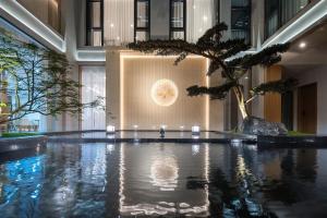Bazén v ubytování Z HOTEL- Qingchengshan nebo v jeho okolí