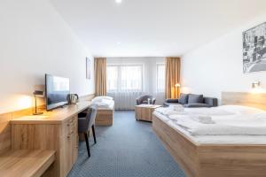 Posteľ alebo postele v izbe v ubytovaní Sport HOTEL Centrum