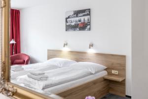 Posteľ alebo postele v izbe v ubytovaní Sport HOTEL Centrum
