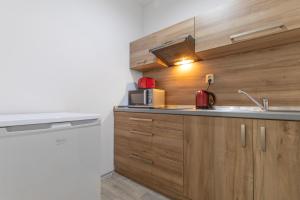 Kuchyňa alebo kuchynka v ubytovaní Sport HOTEL Centrum