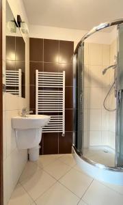 Koupelna v ubytování Willa Dzika Róża + 40 fotografií