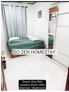Ένα ή περισσότερα κρεβάτια σε δωμάτιο στο So Zen Homestay