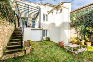 Κήπος έξω από το Maison familiale au cœur du vignoble de St Emilion