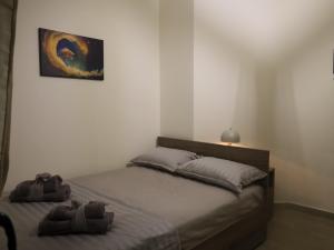 Postel nebo postele na pokoji v ubytování Xanthi BnB3
