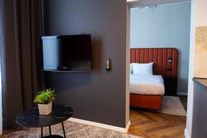 Ένα ή περισσότερα κρεβάτια σε δωμάτιο στο Unlimited Apartment- CENTRUM, faktura