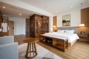 Postel nebo postele na pokoji v ubytování Z HOTEL- Qingchengshan
