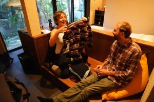 a man and a woman sitting on a bed at RoheN HAKONEYUMOTO in Hakone +42 photos
